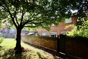 Rear elevation/communal garden- click for photo gallery